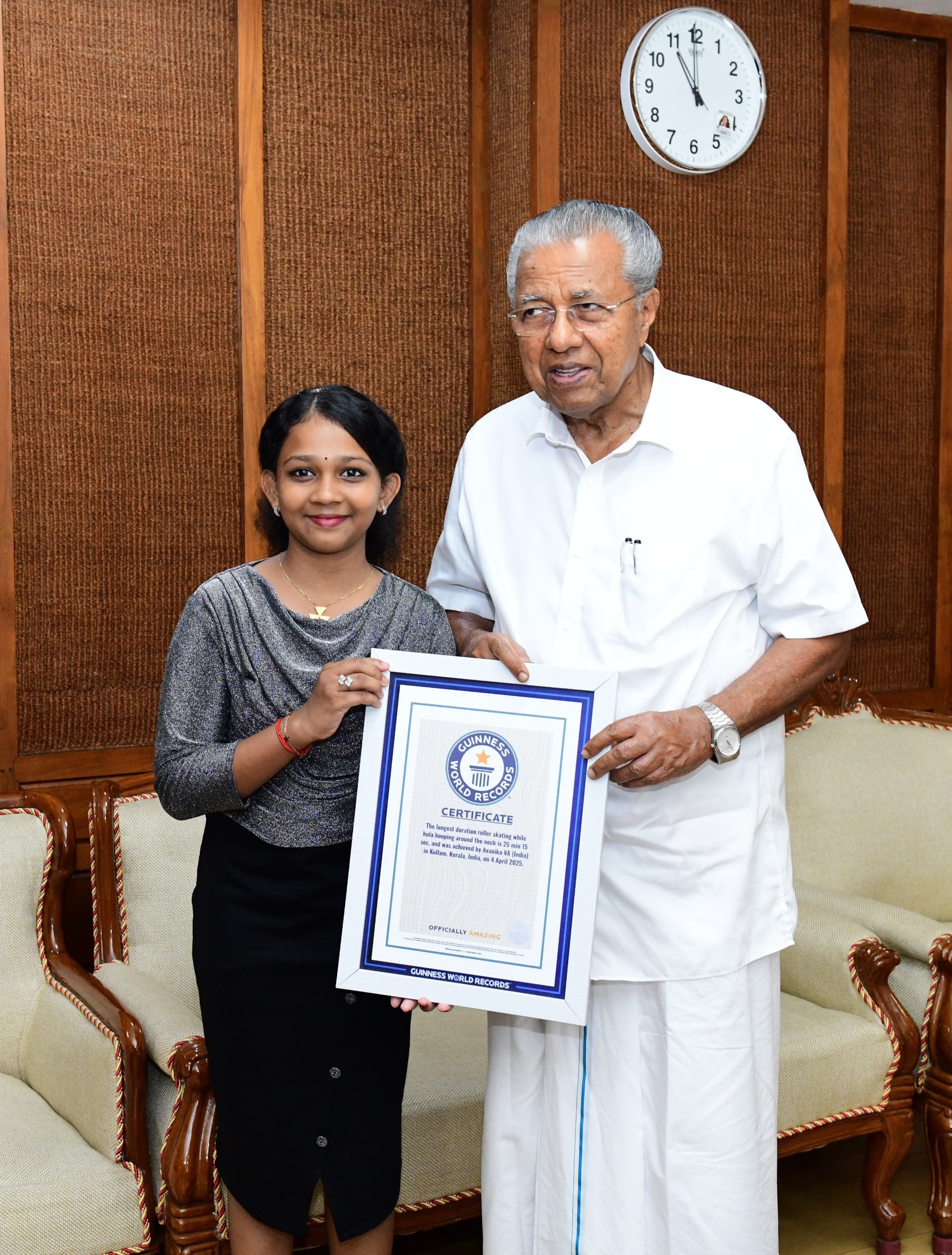 Avanika and Coach Afi with Chief Minister Pinarayi Vijayan